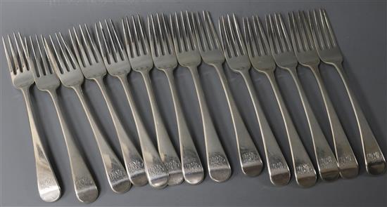 A set of fourteen George III silver Old English pattern table forks by Thomas Wallis II, 28 oz.